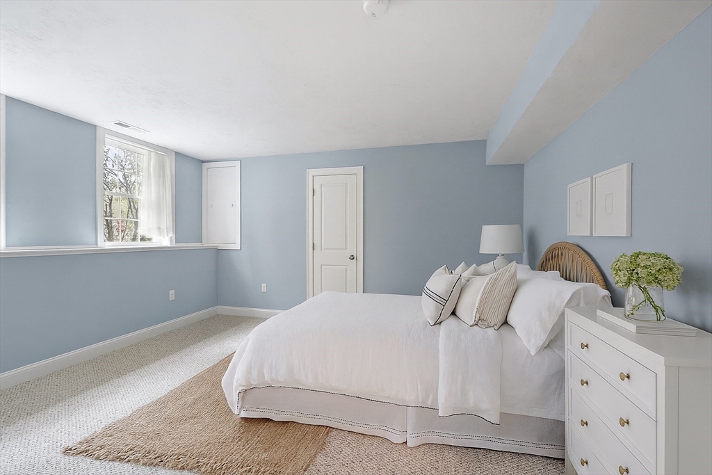 82 Littleton Road Ayer, MA 01432 - Photo 11 of 14 a bedroom with bed and window