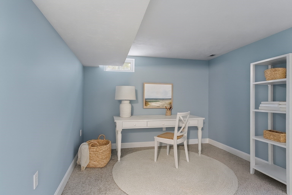 82 Littleton Road Ayer, MA 01432 - Photo 13 of 14 a dining room with a table and chairs