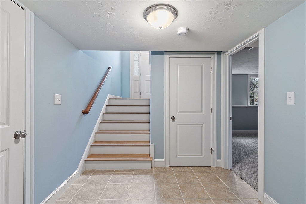 82 Littleton Road Ayer, MA 01432 - Photo 10 of 14 a view of entryway with wooden floor