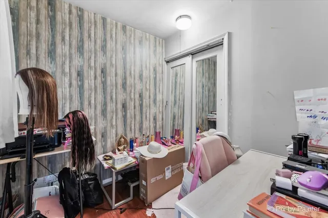 a room with furniture and musical instruments