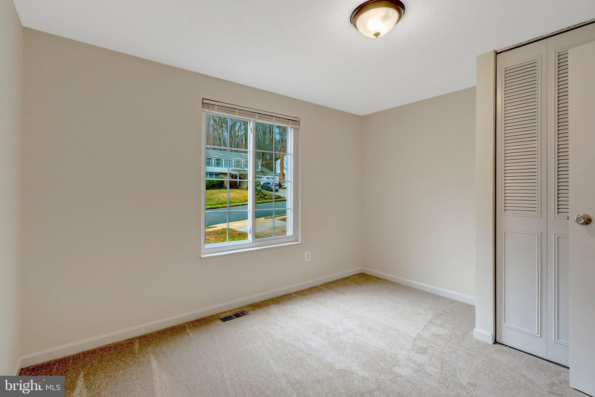 7743 Middle Valley Drive Springfield, VA 22153 - Photo 12 of 17 an empty room with window