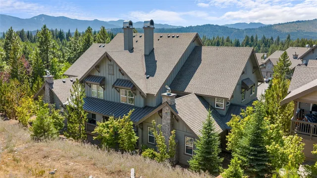 an aerial view of a house with a garden