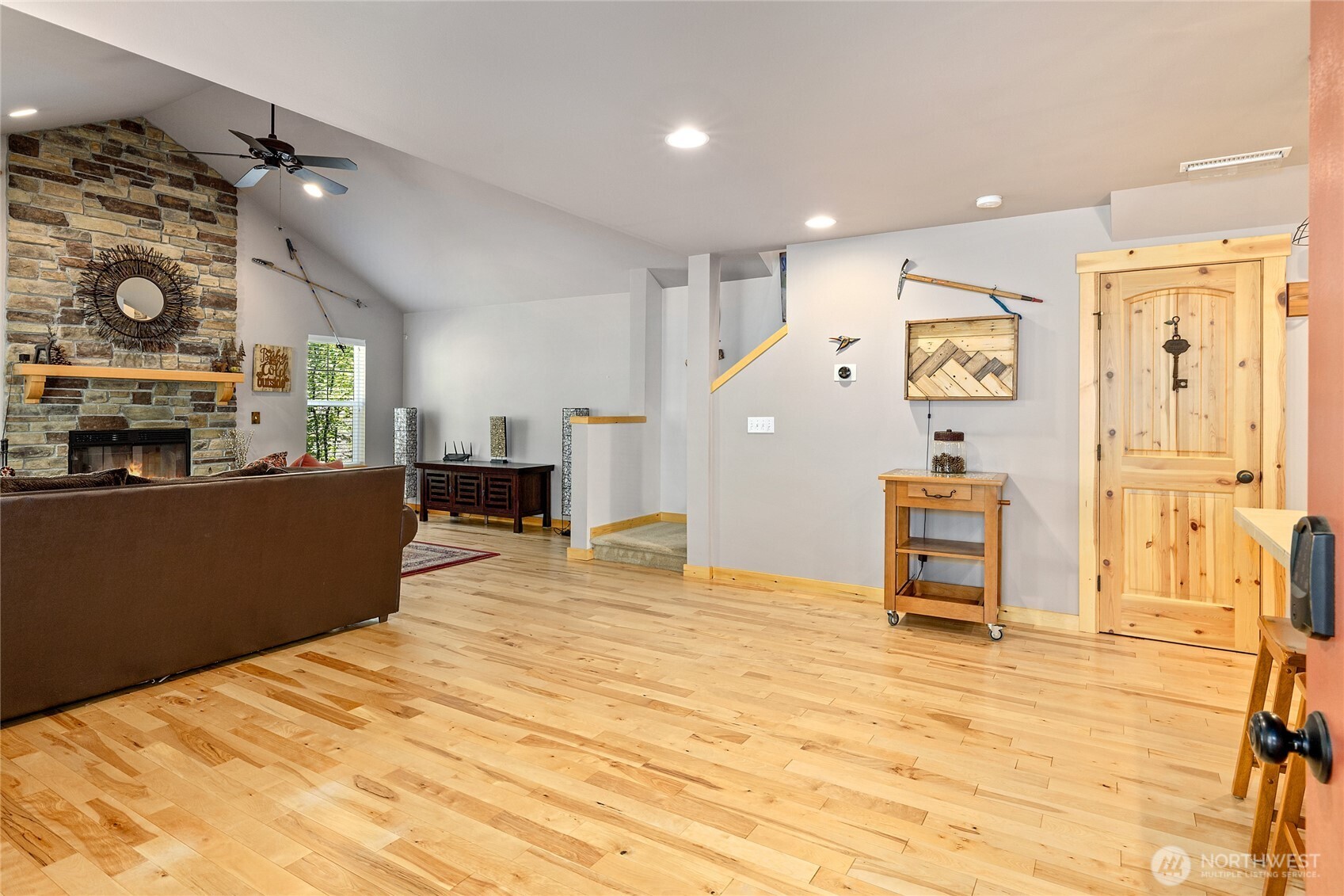 200 Clearwater Loop, Unit 1 Ronald, WA 98940 - Photo 9 of 40 a large kitchen with stainless steel appliances kitchen island granite countertop a refrigerator and a stove top oven