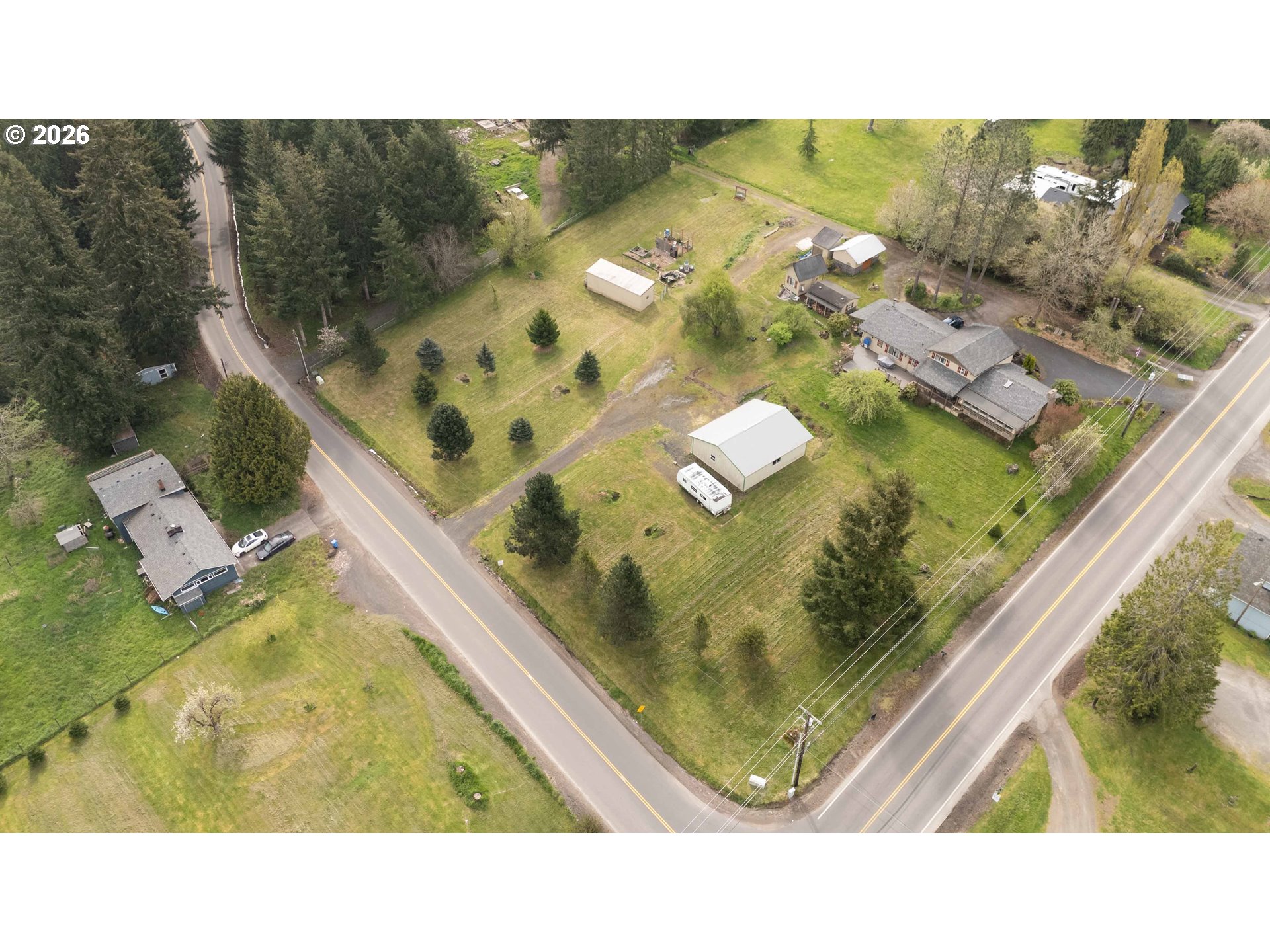 107 Bodine Road Kelso, WA 98626 - Photo 1 of 15 a black and white photo of a tennis court