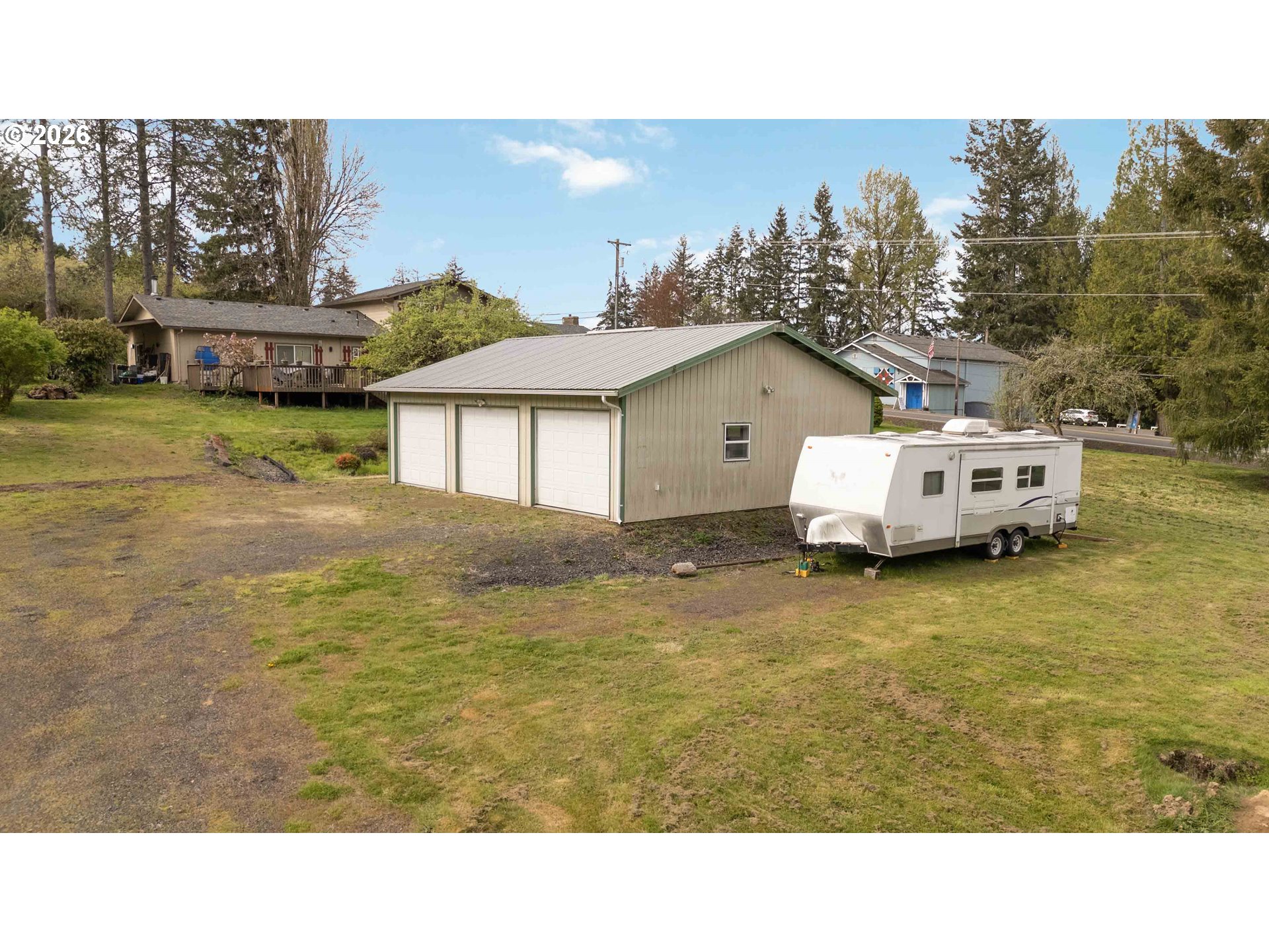 107 Bodine Road Kelso, WA 98626 - Photo 6 of 15 a house view with a garden space