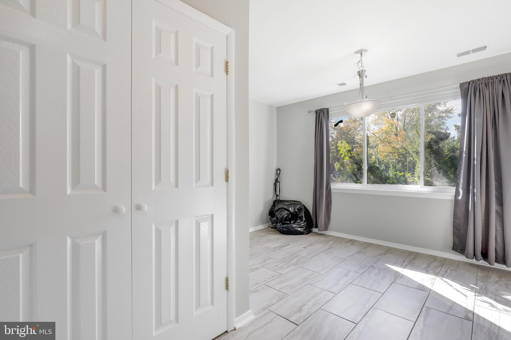 7749 Notley Road Pasadena, MD 21122 - Photo 8 of 26 Laundry closet