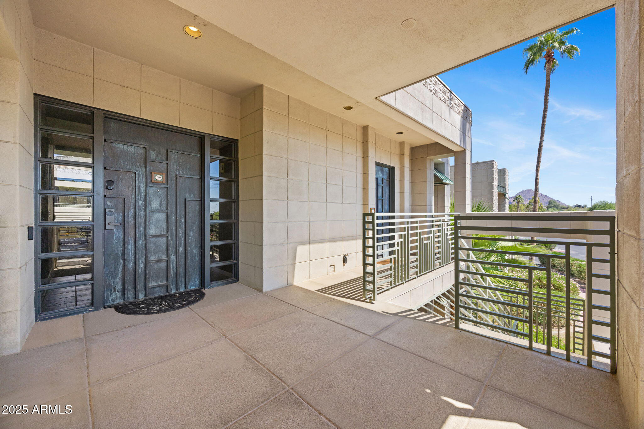 2802 East Camino Acequia Drive, Unit 8 Phoenix, AZ 85016 - Photo 2 of 34 an empty room with windows
