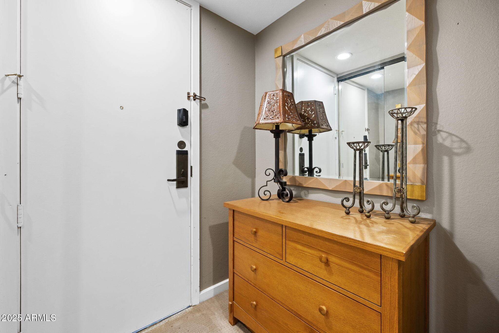 2802 East Camino Acequia Drive, Unit 8 Phoenix, AZ 85016 - Photo 24 of 34 a bathroom with a double vanity sink and a mirror