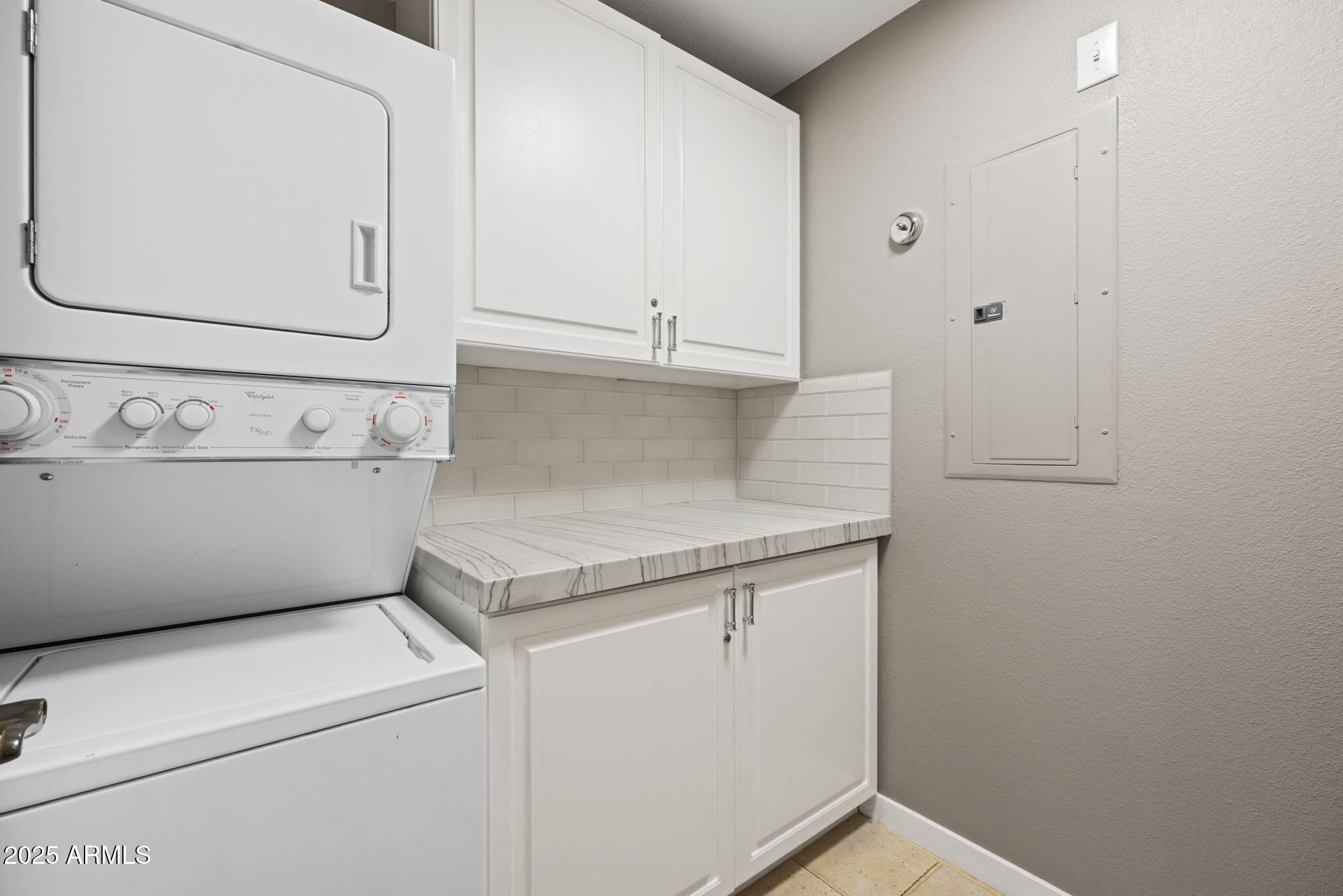 2802 East Camino Acequia Drive, Unit 8 Phoenix, AZ 85016 - Photo 25 of 34 a utility room with dryer and washer