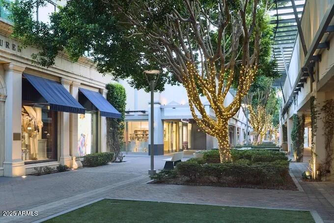 2802 East Camino Acequia Drive, Unit 8 Phoenix, AZ 85016 - Photo 34 of 34 a front view of a house with garden