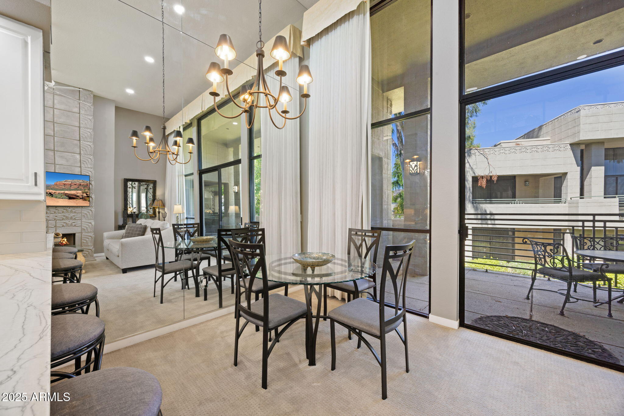 2802 East Camino Acequia Drive, Unit 8 Phoenix, AZ 85016 - Photo 4 of 34 a view of a dining room with furniture
