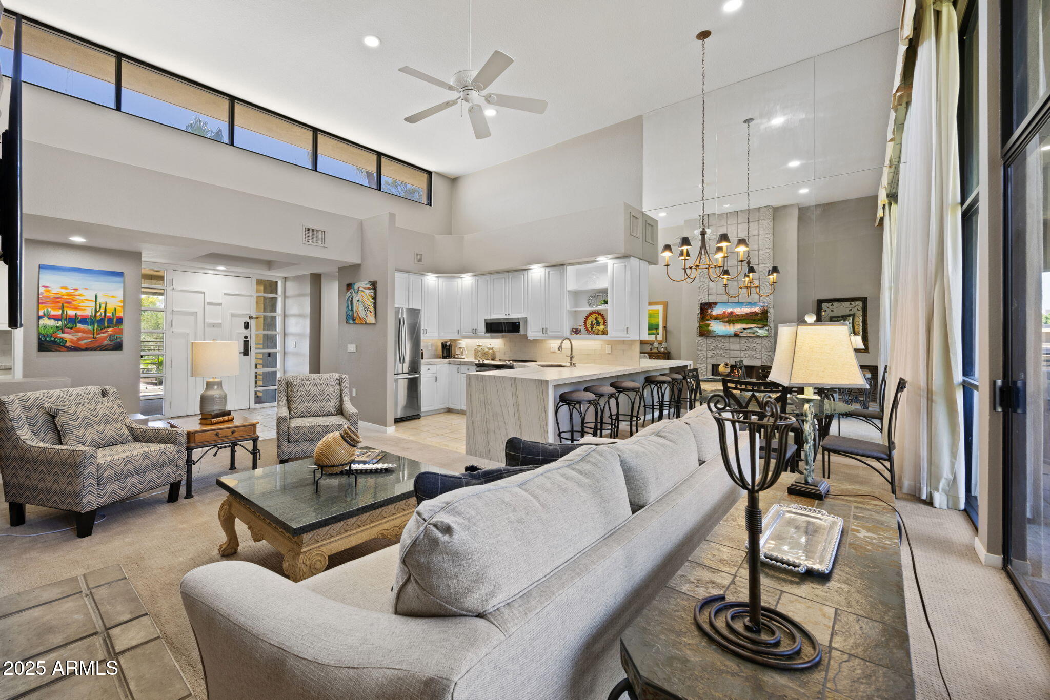 2802 East Camino Acequia Drive, Unit 8 Phoenix, AZ 85016 - Photo 6 of 34 a living room with furniture and kitchen view