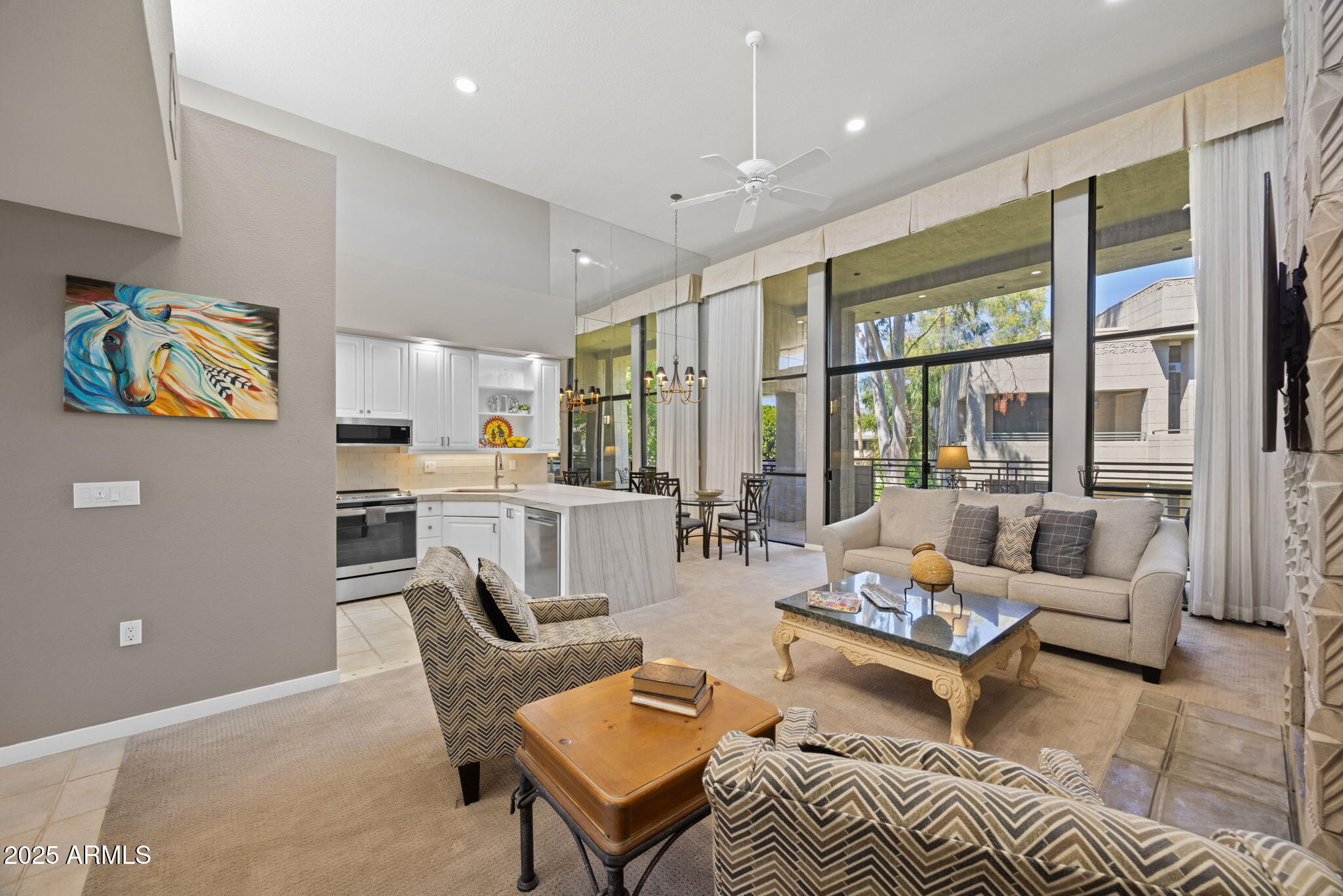 2802 East Camino Acequia Drive, Unit 8 Phoenix, AZ 85016 - Photo 8 of 34 a living room with furniture and large window