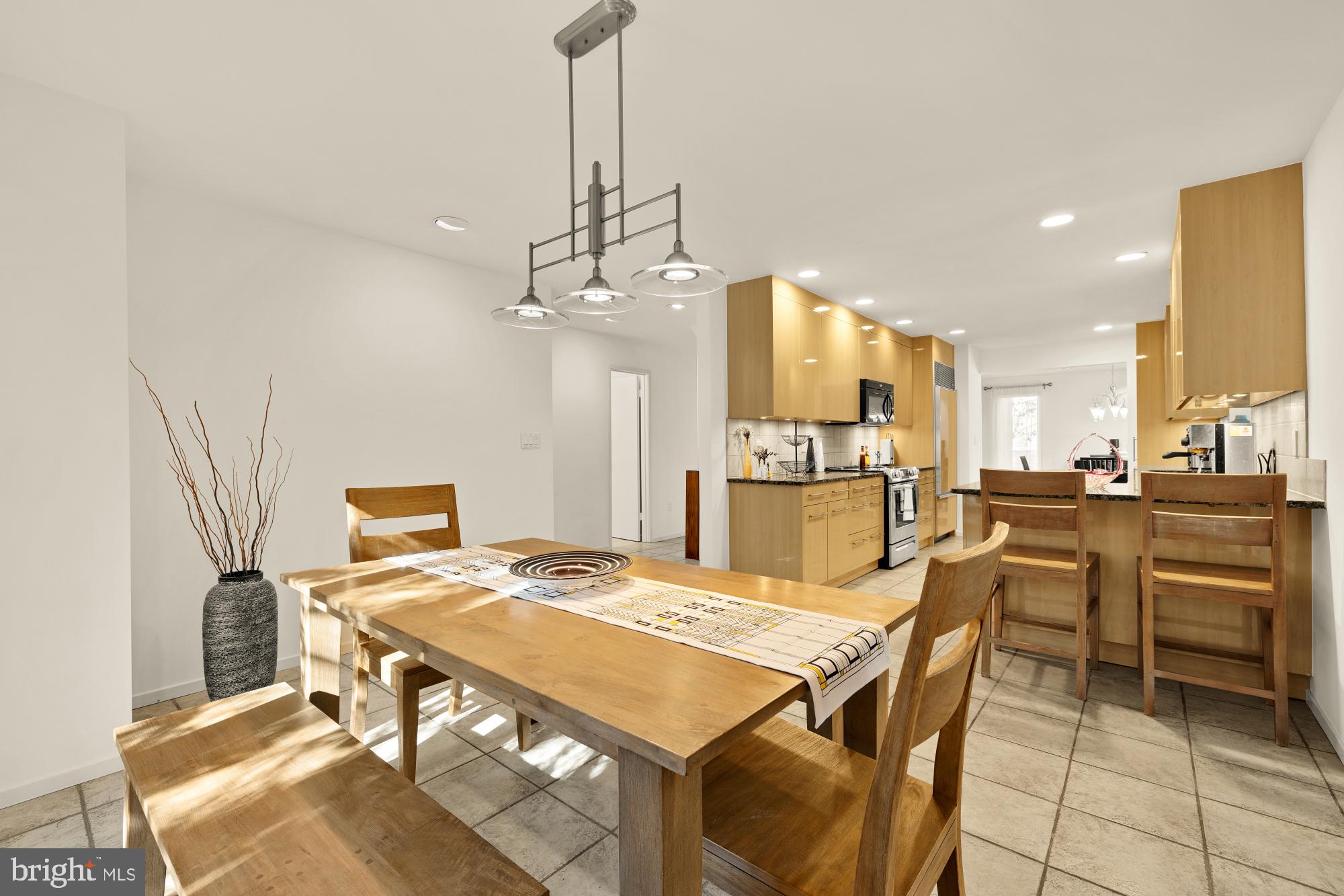 10419 Crossing Creek Road Potomac, MD 20854 - Photo 10 of 74 a view of a dining room with furniture