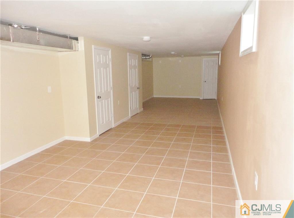 715 Spruce Road North Brunswick, NJ 08902 - Photo 17 of 23 a view of an empty room