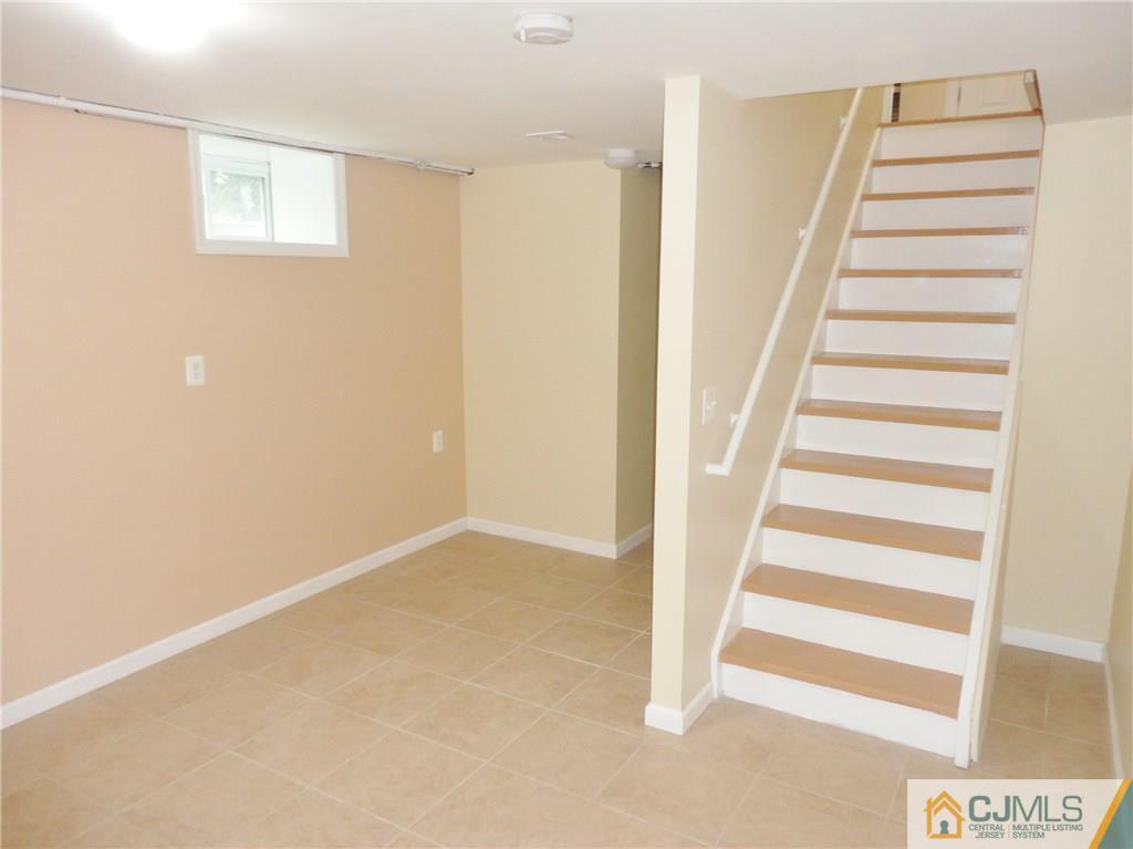 715 Spruce Road North Brunswick, NJ 08902 - Photo 19 of 23 a view of entryway with stairs