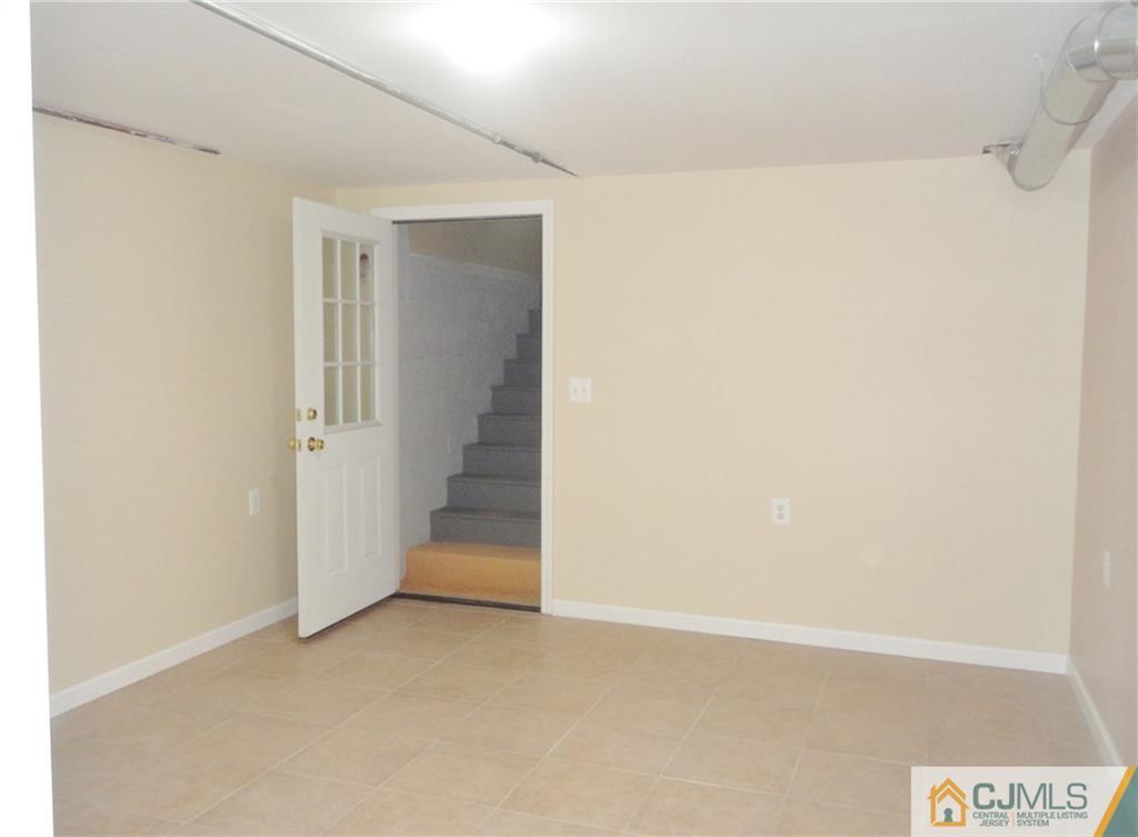 715 Spruce Road North Brunswick, NJ 08902 - Photo 20 of 23 a view of an empty room