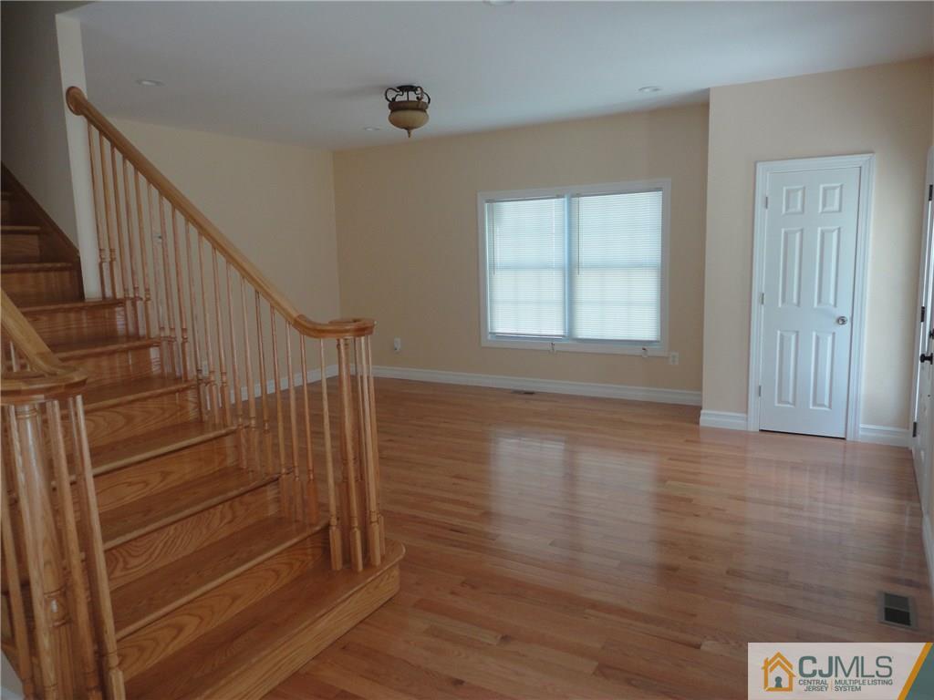 715 Spruce Road North Brunswick, NJ 08902 - Photo 5 of 23 a view of entryway with wooden floor