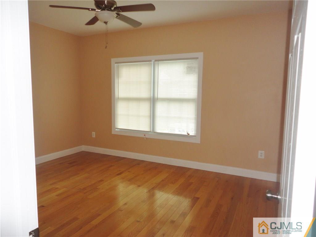 715 Spruce Road North Brunswick, NJ 08902 - Photo 9 of 23 an empty room with a window