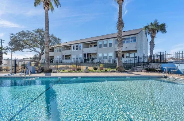 a view of a house with swimming pool