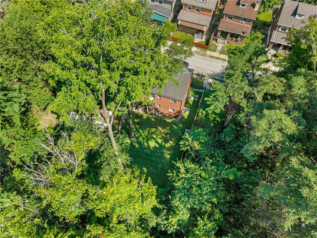 1627-1629 Laketon Road Pittsburgh, PA 15221 - Photo 7 of 26 an aerial view of a house with a yard