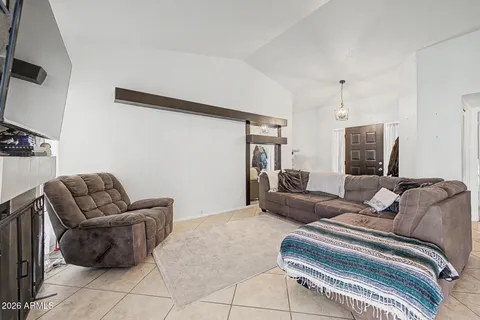 a bedroom with furniture and a couch