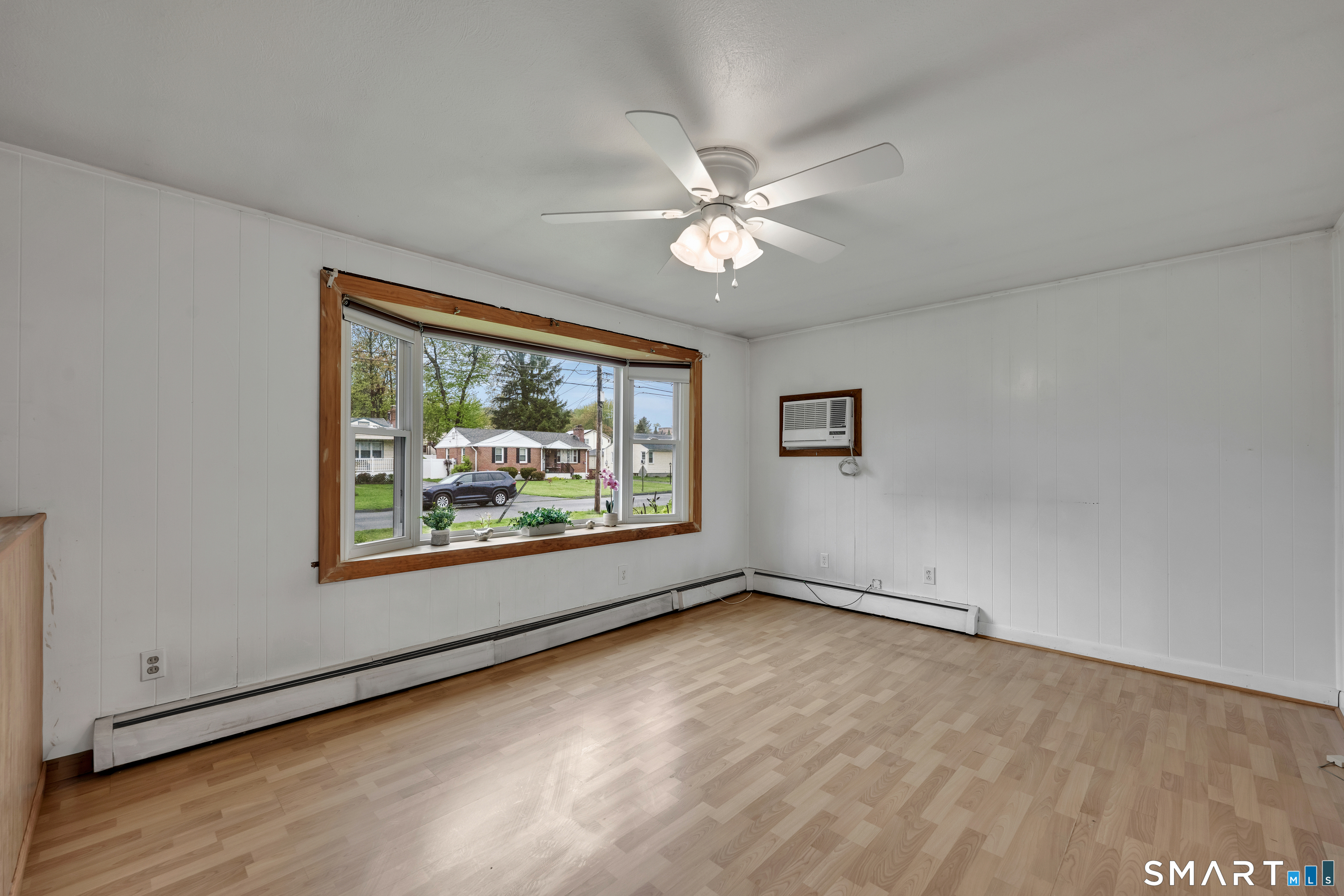 120 Goodwin Avenue Wethersfield, CT 06109 - Photo 2 of 30 Living Room, Wall Unit Air Conditioning, Big Bright window.