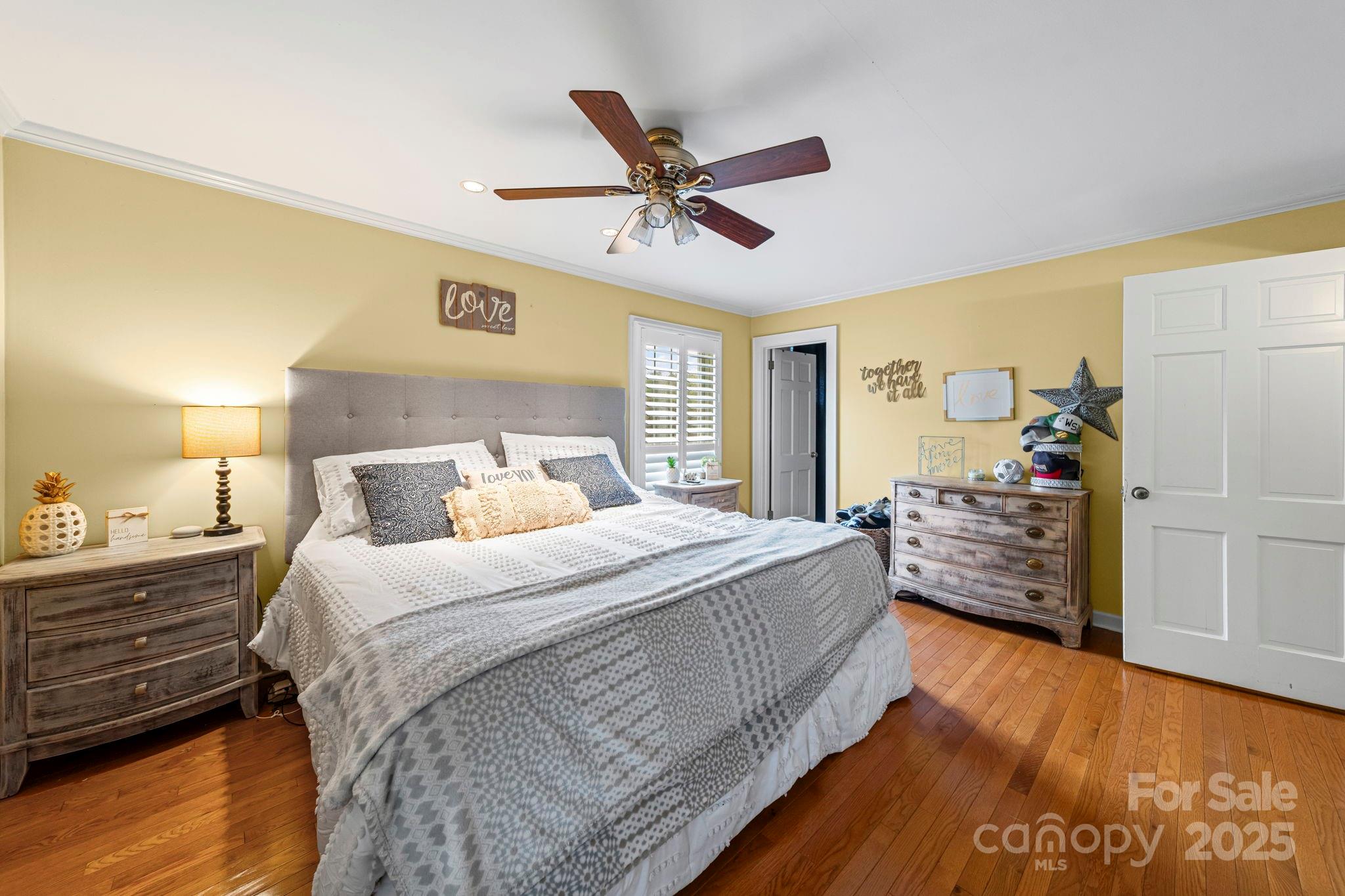 417 Park Ridge Road Albemarle, NC 28001 - Photo 22 of 48 a bedroom with a bed and ceiling fan