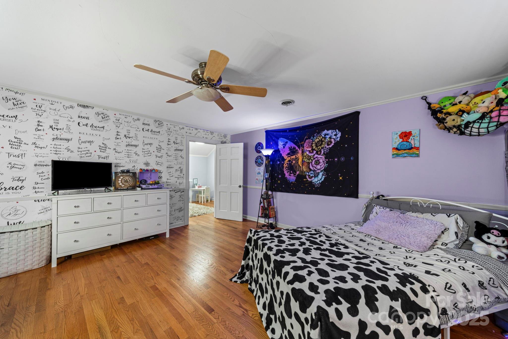 417 Park Ridge Road Albemarle, NC 28001 - Photo 34 of 48 a bedroom with a bed and furniture