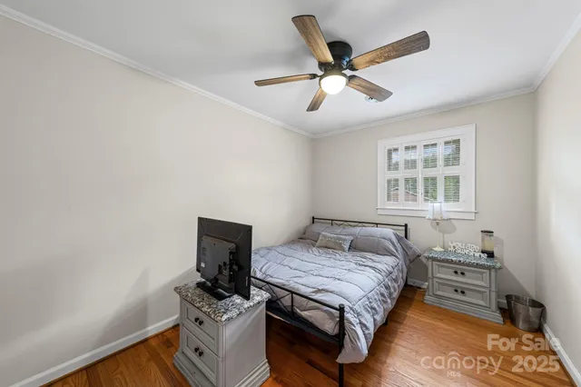 a bathroom with a sink mirror and a shower