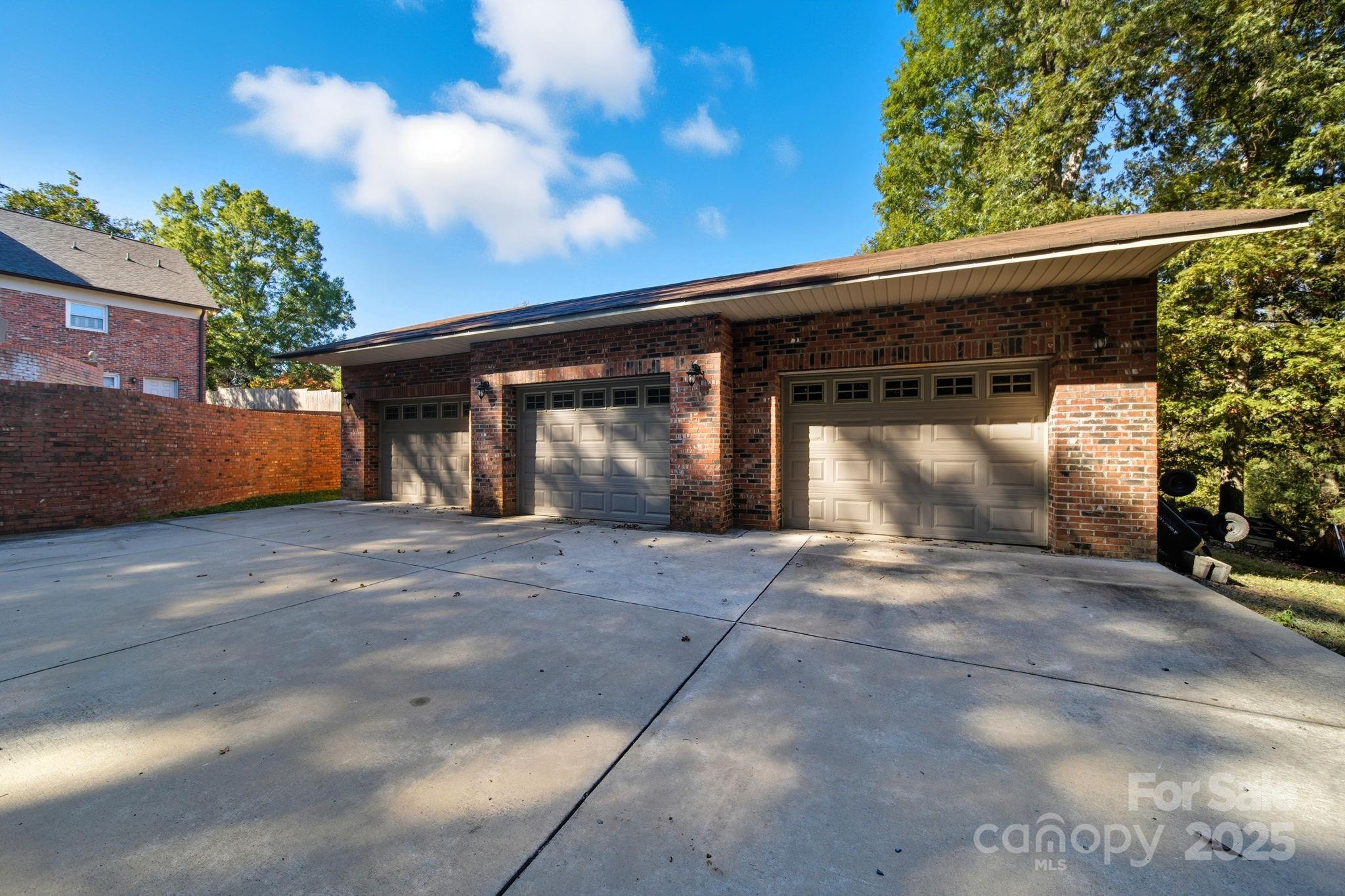 417 Park Ridge Road Albemarle, NC 28001 - Photo 6 of 48 a front view of a house with garden