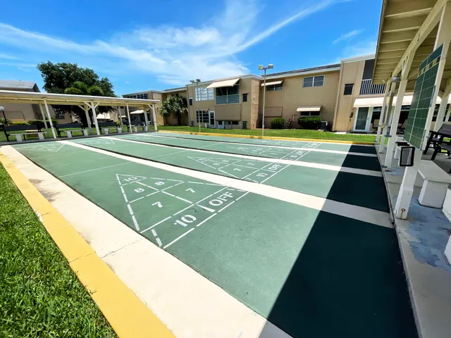 a view of an outdoor space pool patio and living room