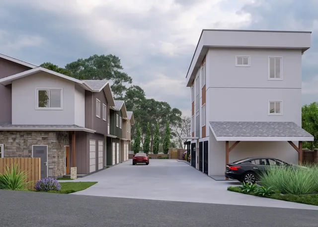 a front view of a house with garage