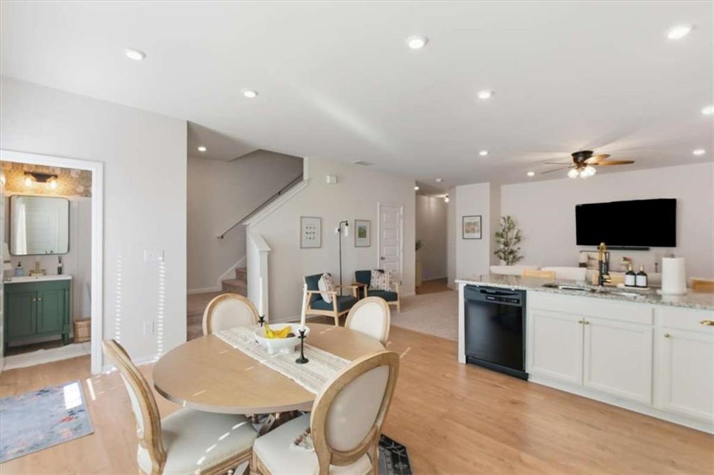 91 Pinnacle Way Jasper, GA 30143 - Photo 15 of 37 a living room with furniture a flat screen tv and kitchen view