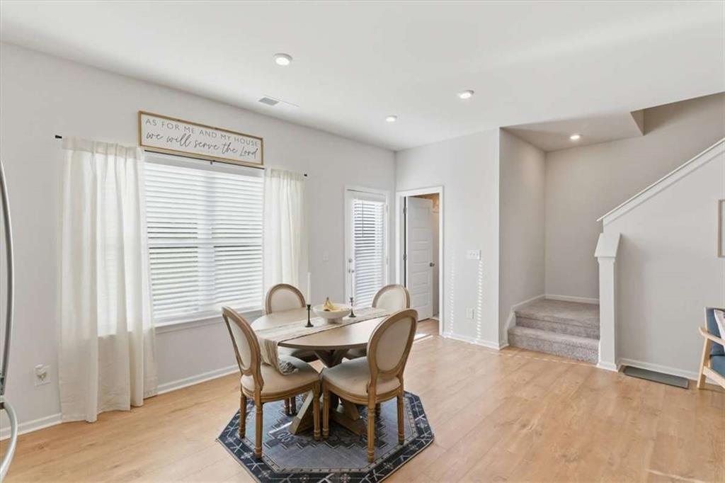 91 Pinnacle Way Jasper, GA 30143 - Photo 18 of 37 a dining room with furniture and a large window