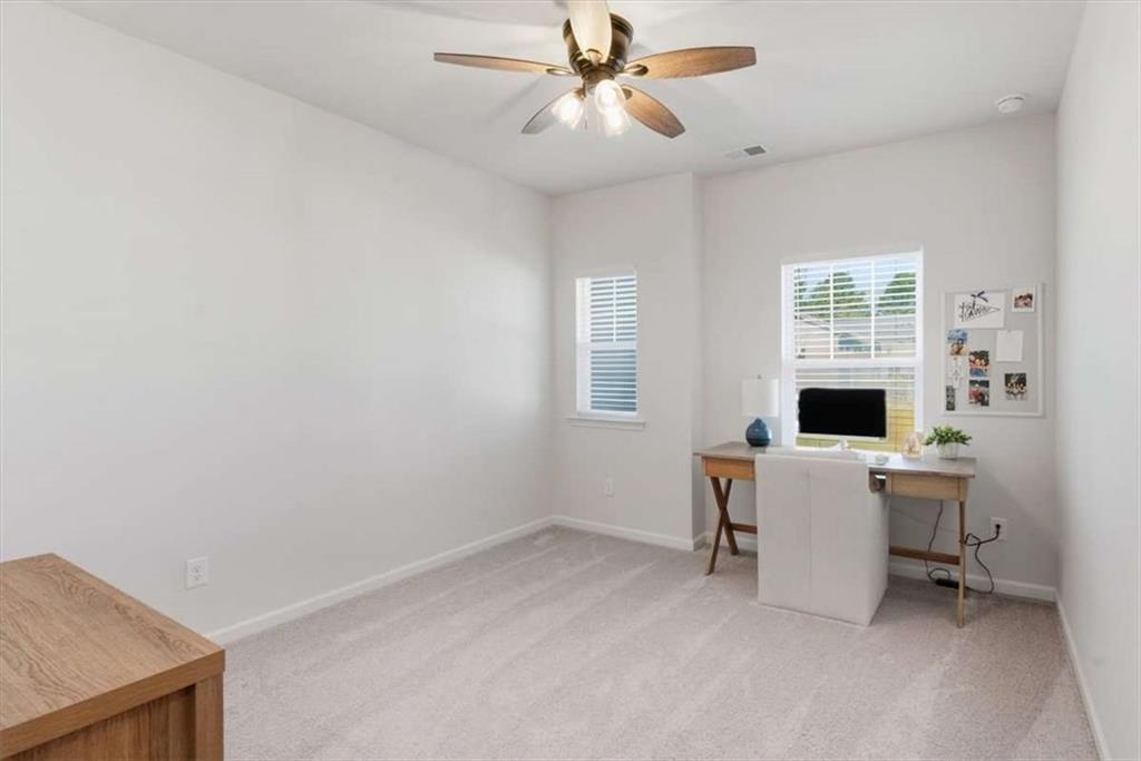 91 Pinnacle Way Jasper, GA 30143 - Photo 28 of 37 a view of a workspace with furniture and a window