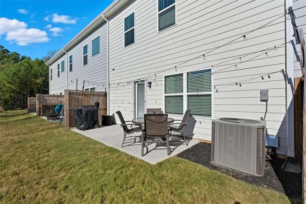 91 Pinnacle Way Jasper, GA 30143 - Photo 32 of 37 a building outdoor space with patio furniture and garden