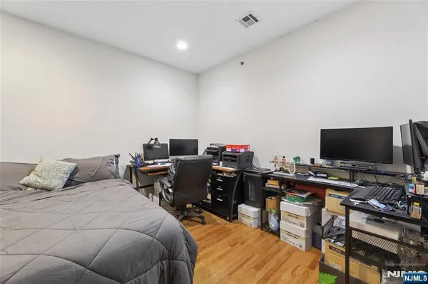 a kitchen with a white stove top oven and refrigerator