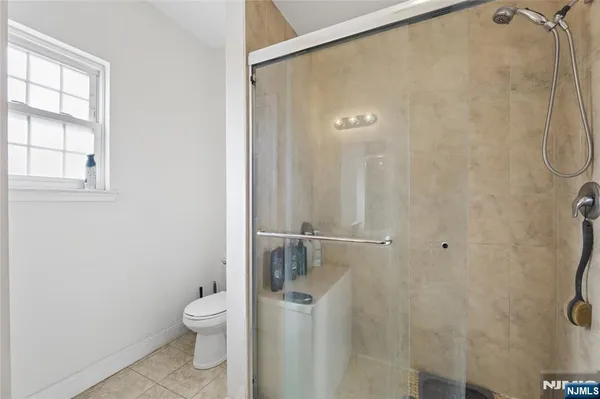 a view of a livingroom with furniture and toys