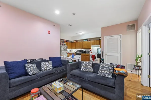 a view of a hallway with closet