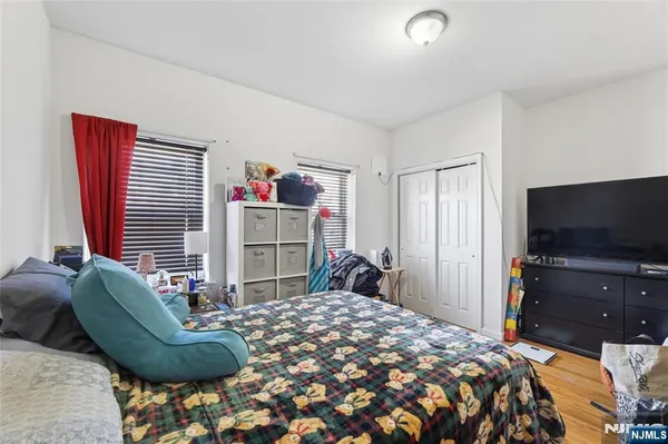 a view of a bathroom with a tub and shower