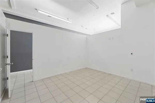 a view of a hallway with closet