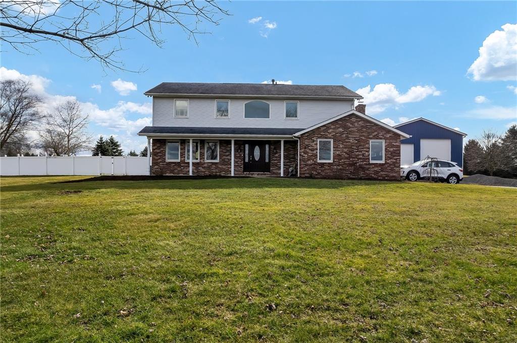 144 Wetzel Road Sarver, PA 16055 - Photo 1 of 48 a view of a house with a big yard and large trees