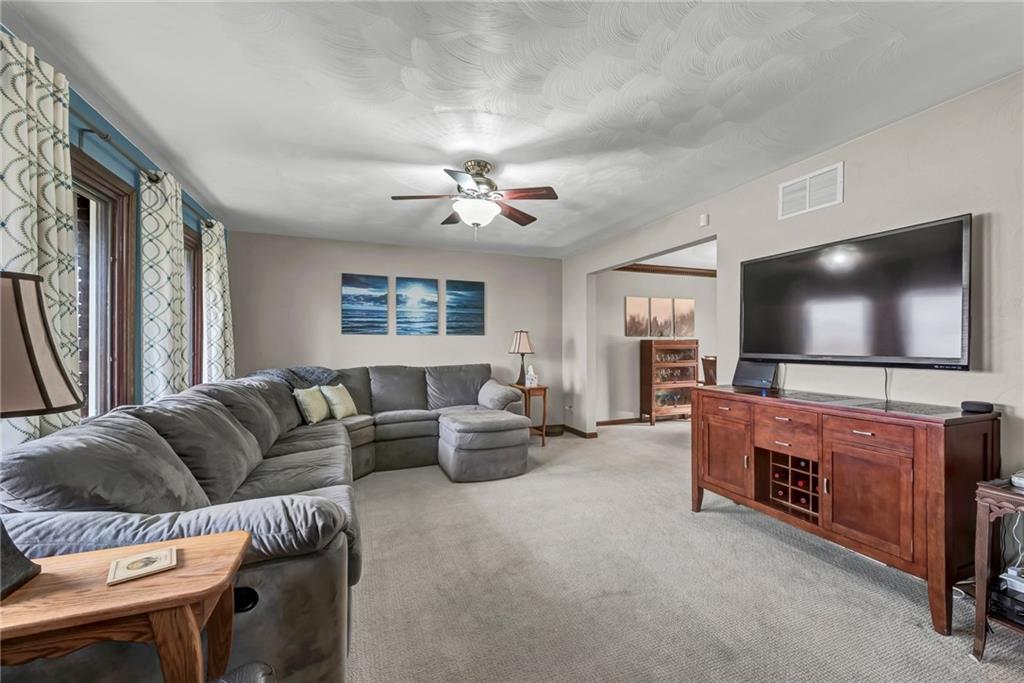144 Wetzel Road Sarver, PA 16055 - Photo 19 of 48 a living room with furniture and a flat screen tv