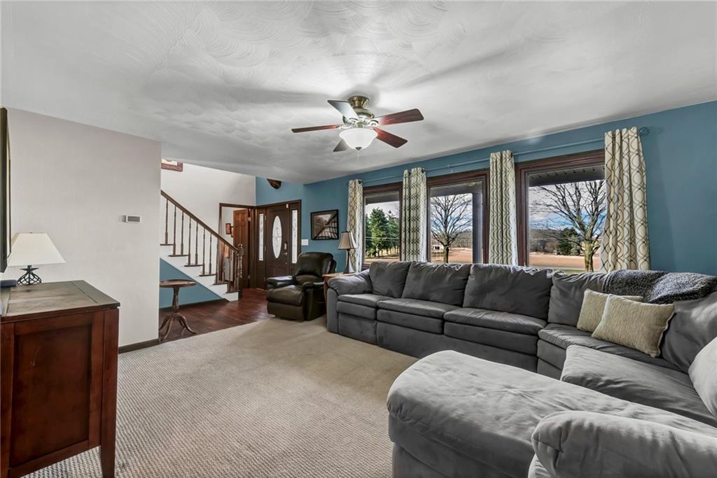144 Wetzel Road Sarver, PA 16055 - Photo 21 of 48 a living room with furniture and a large window