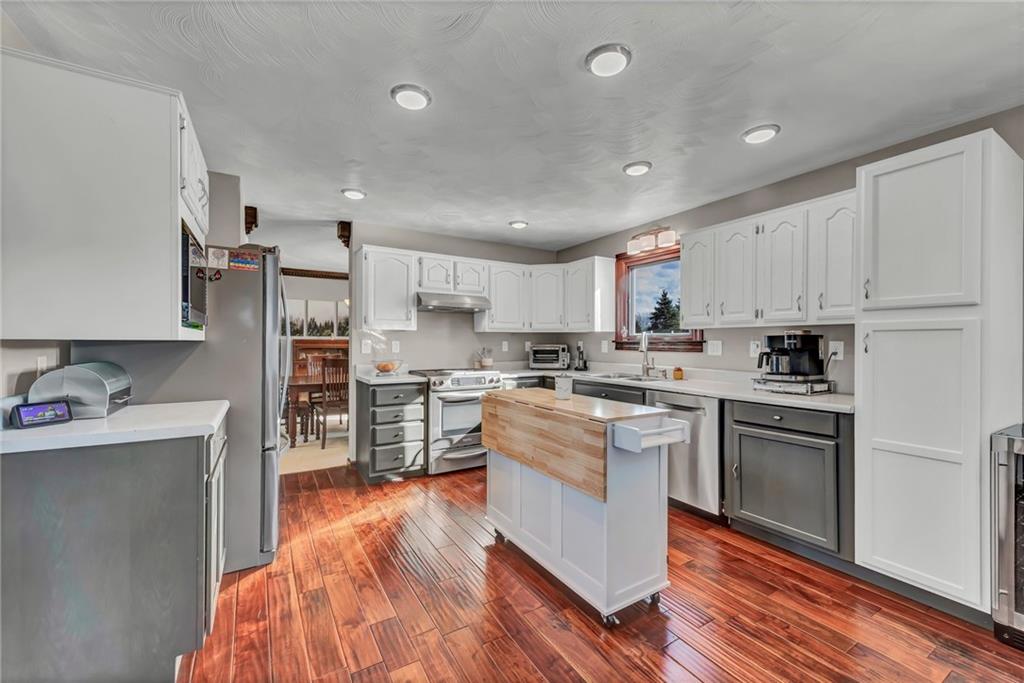 144 Wetzel Road Sarver, PA 16055 - Photo 26 of 48 a kitchen with white cabinets and stainless steel appliances