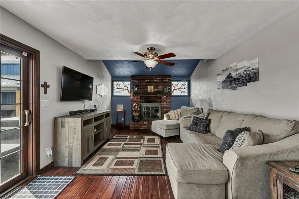 144 Wetzel Road Sarver, PA 16055 - Photo 30 of 48 a living room with furniture and a flat screen tv