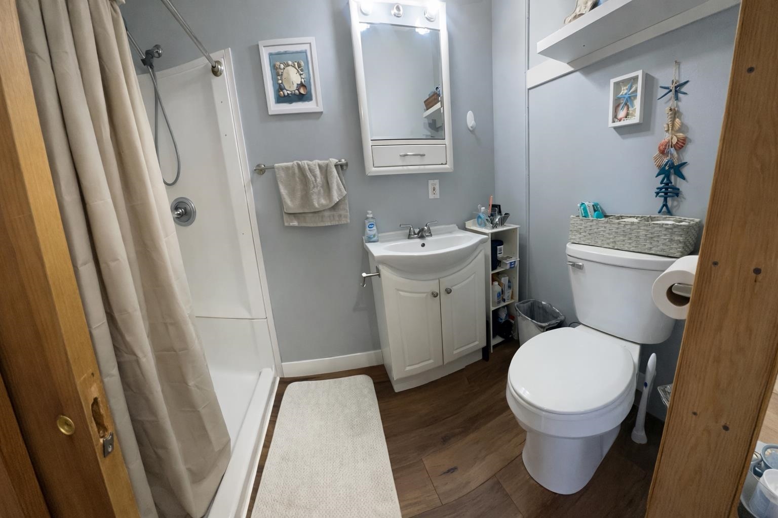 307 South 5th Street Oregon, IL 61061 - Photo 11 of 18 a white toilet sitting next to a sink