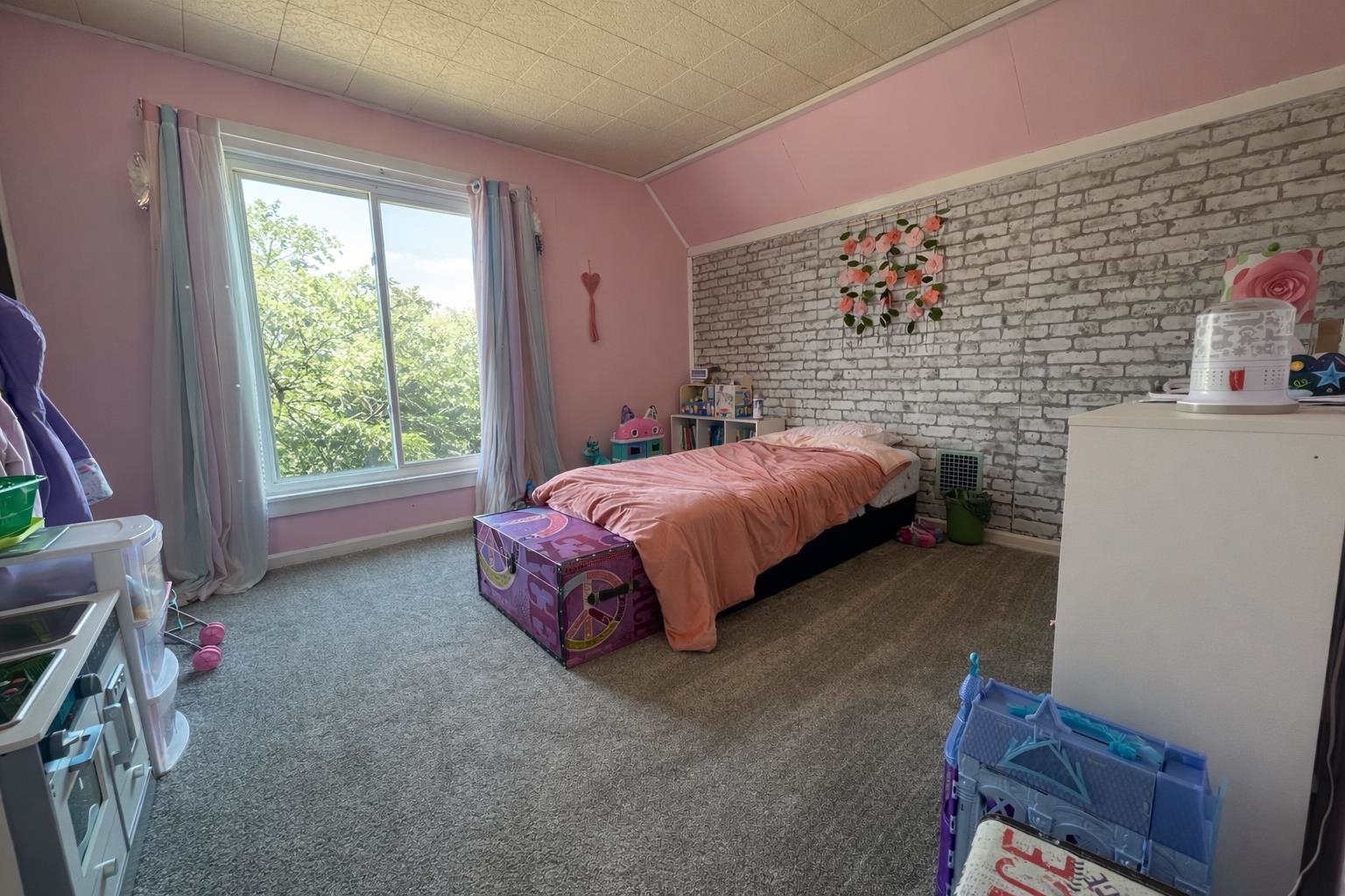 307 South 5th Street Oregon, IL 61061 - Photo 15 of 18 a bed room with a bed and a window
