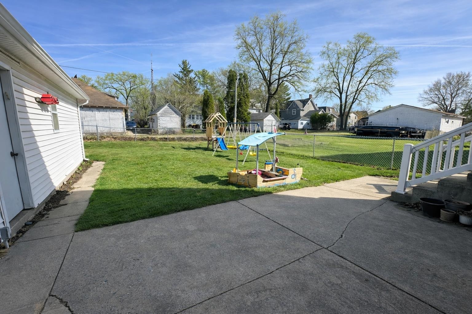 307 South 5th Street Oregon, IL 61061 - Photo 18 of 18 a front view of a house with garden